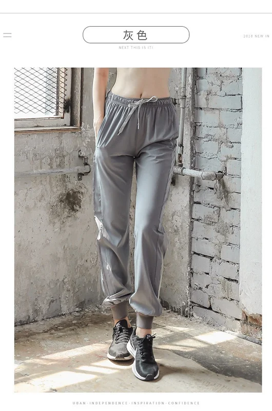 Quần dài jogger nữ vải dù hàng Quảng Châu phong cách thể thao, năng động
